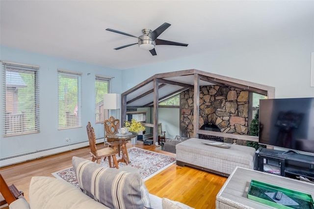 45 Broadview Dr, Commack, NY 11725 - living area featuring wood finished floors, a ceiling fan, and a baseboard radiator