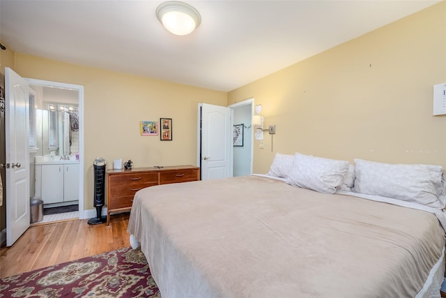 45 Broadview Dr, Commack, NY 11725 - bedroom featuring light wood-type flooring and ensuite bath