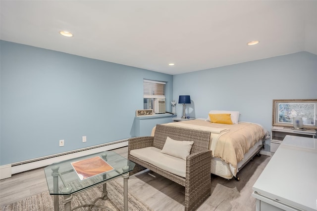 45 Broadview Dr, Commack, NY 11725 - bedroom featuring wood finished floors, a baseboard heating unit, recessed lighting, and cooling unit