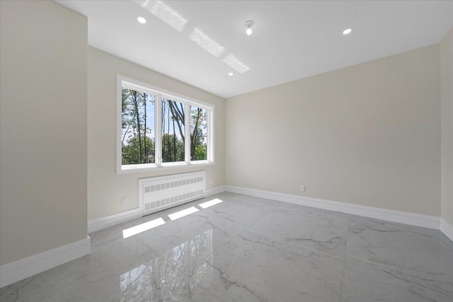 42 Greycourt Rd, Chester, NY 10918 - empty room featuring radiator, marble finish floors, baseboards, and recessed lighting