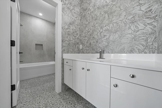 42 Greycourt Rd, Chester, NY 10918 - full bathroom featuring wallpapered walls, vanity, speckled floor, and shower / bath combination