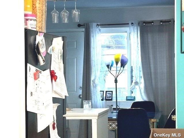 94-68 45th Ave, Elmhurst, NY 11373 - dining area view of freestanding refrigerator and an office area
