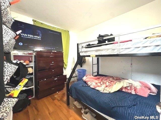 94-68 45th Ave, Elmhurst, NY 11373 - bedroom with wood finished floors