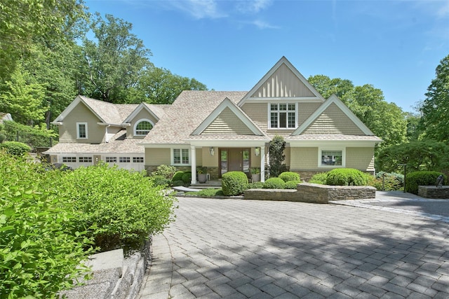93 Haights Cross Rd, Chappaqua, NY 10514 - shingle-style home with covered porch and stone siding