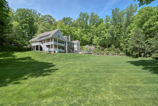 93 Haights Cross Rd, Chappaqua, NY 10514 - view of green lawn with a deck and stairway