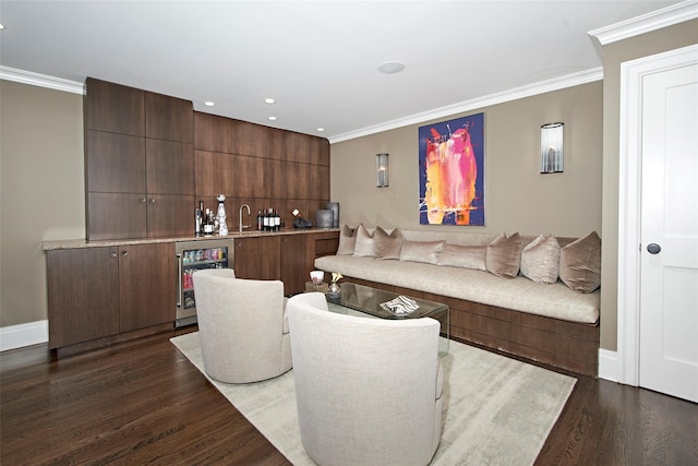 93 Haights Cross Rd, Chappaqua, NY 10514 - living area featuring beverage cooler, wet bar, ornamental molding, dark wood-style floors, and baseboards