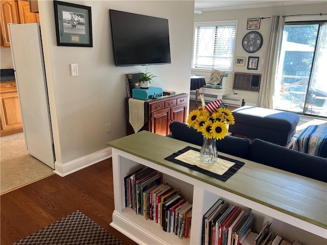 129 Main St Unit C8, Cornwall, NY 12518 - living room featuring wood finished floors, baseboards, and ornamental molding