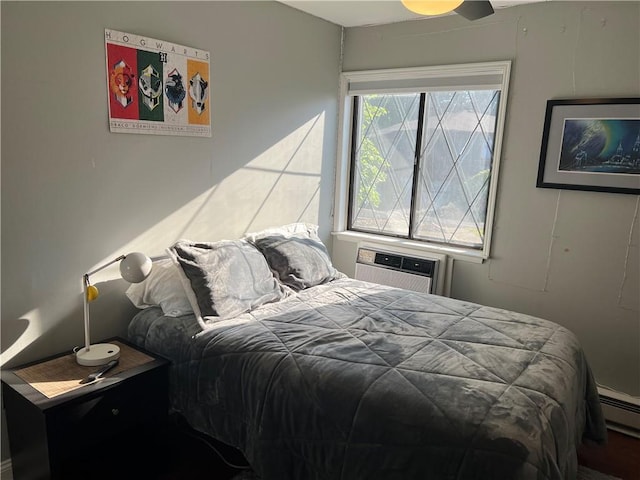 129 Main St Unit C8, Cornwall, NY 12518 - bedroom featuring a baseboard radiator and a wall unit AC