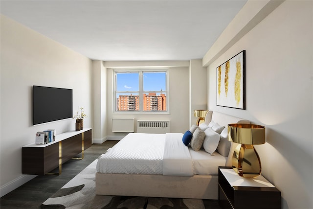 825 Morrison Ave Unit 5H, Bronx, NY 10473 - bedroom with radiator, baseboards, and dark wood finished floors