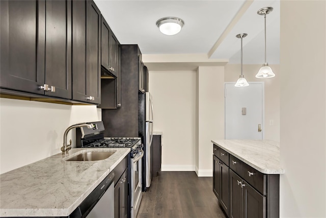 825 Morrison Ave Unit 5H, Bronx, NY 10473 - kitchen featuring stainless steel appliances, dark wood-style floors, light stone counters, baseboards, and a sink