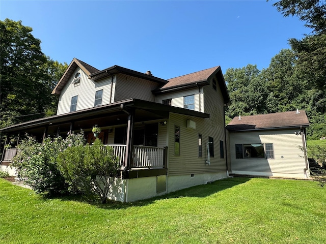 459 Illington Rd, Ossining, NY 10562 - rear view of property featuring a yard and covered porch