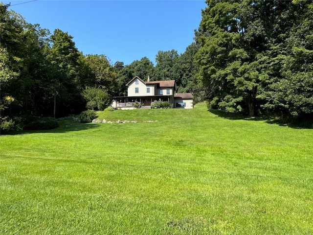 459 Illington Rd, Ossining, NY 10562 - view of grassy yard with a view of trees