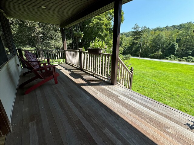 459 Illington Rd, Ossining, NY 10562 - wooden deck featuring a yard and a wooded view