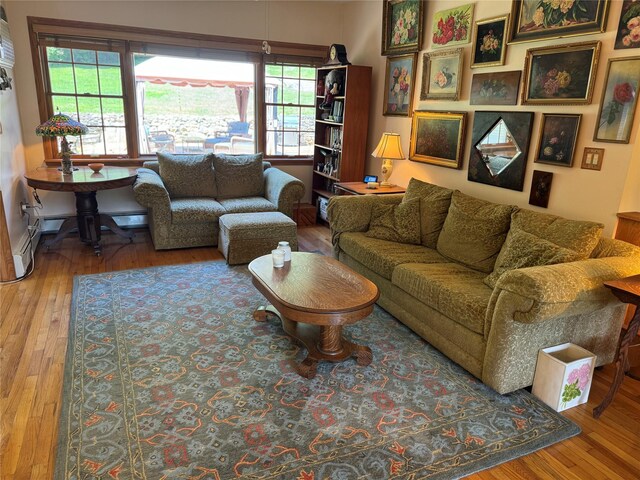 459 Illington Rd, Ossining, NY 10562 - living room featuring hardwood / wood-style floors and baseboard heating