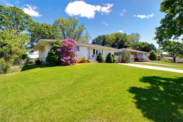 21 Rita Cres, Commack, NY 11725 - ranch-style home featuring a garage, concrete driveway, and central AC