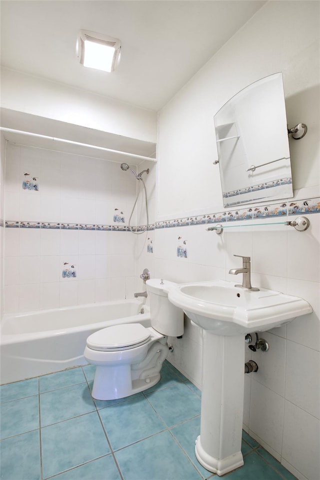 21 Rita Cres, Commack, NY 11725 - full bath with toilet, shower / bath combination, tile walls, tile patterned flooring, and wainscoting