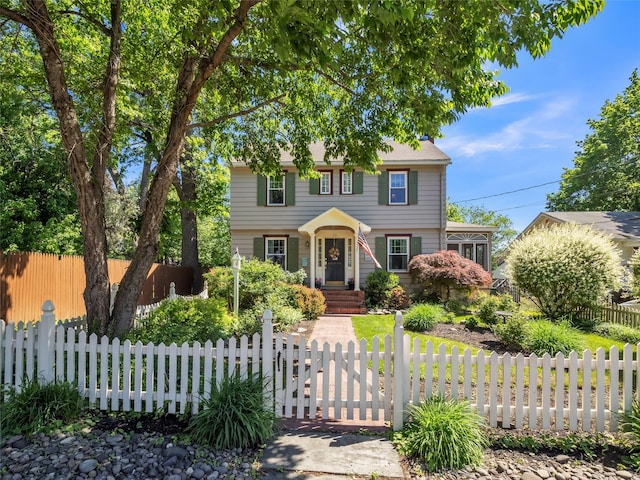 20 Tusten Ave, Goshen, NY 10924 - colonial inspired home with a fenced front yard