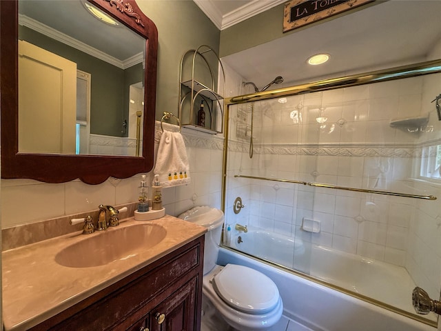 20 Tusten Ave, Goshen, NY 10924 - bathroom with toilet, vanity, bath / shower combo with glass door, ornamental molding, and tile walls