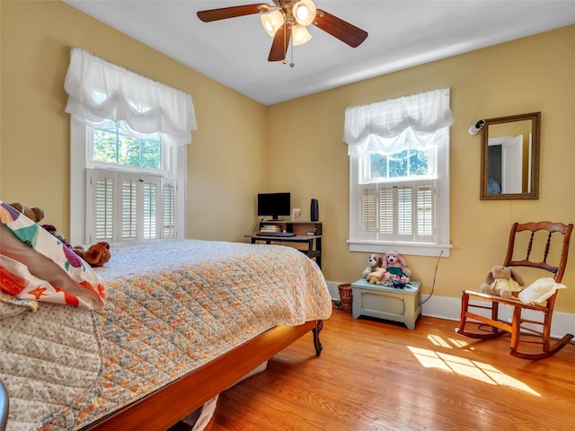 20 Tusten Ave, Goshen, NY 10924 - bedroom featuring multiple windows, wood finished floors, and ceiling fan