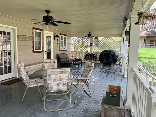 20 Tusten Ave, Goshen, NY 10924 - wooden terrace with outdoor dining space, a grill, and a ceiling fan