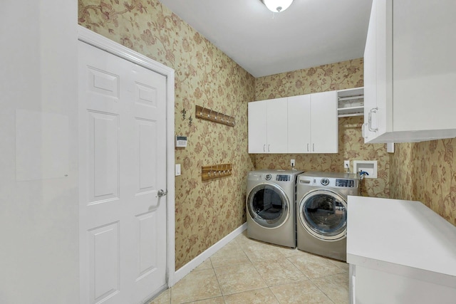 6 Esteves Ct, Melville, NY 11747 - washroom featuring cabinet space, wallpapered walls, separate washer and dryer, light tile patterned flooring, and baseboards