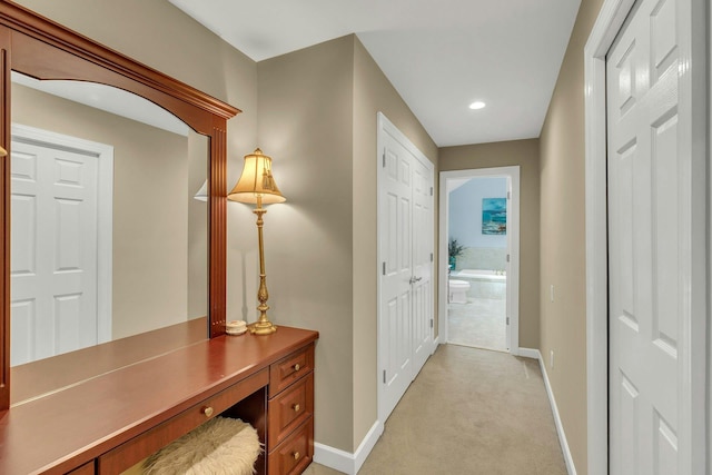6 Esteves Ct, Melville, NY 11747 - hallway featuring baseboards, light colored carpet, and recessed lighting