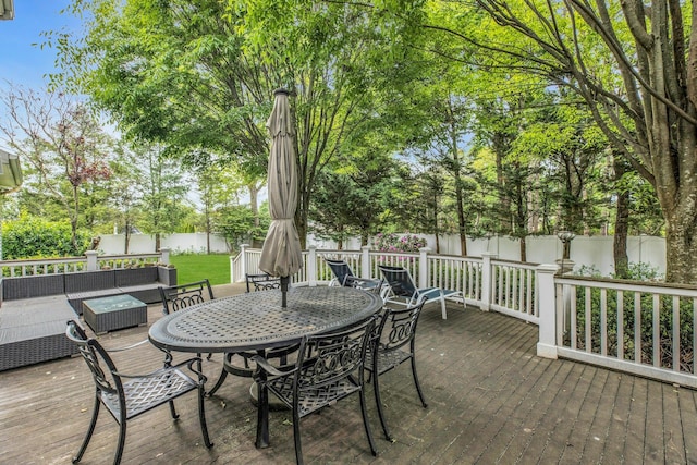 6 Esteves Ct, Melville, NY 11747 - deck with an outdoor living space, a fenced backyard, and outdoor dining space