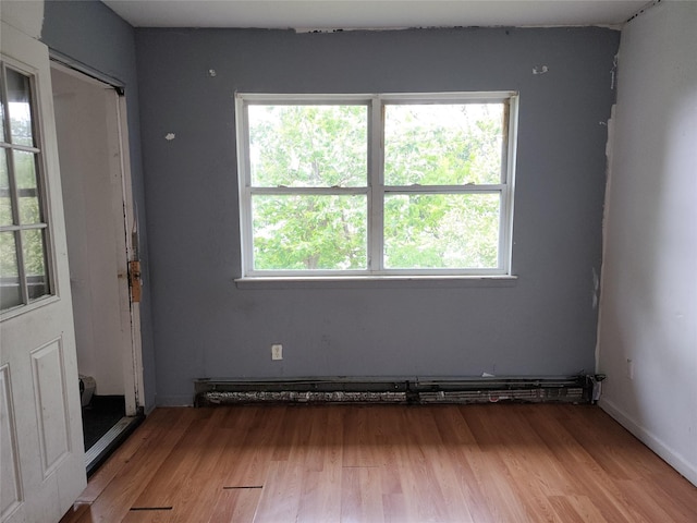 36 S 23rd St, Wyandanch, NY 11798 - entrance foyer with healthy amount of natural light and light wood-style flooring