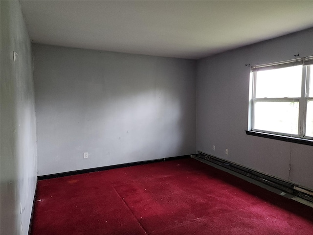 36 S 23rd St, Wyandanch, NY 11798 - carpeted spare room with baseboard heating