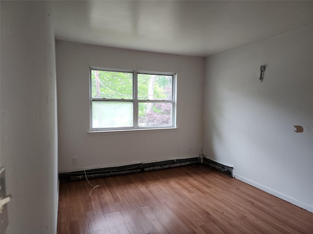 36 S 23rd St, Wyandanch, NY 11798 - unfurnished room with wood finished floors