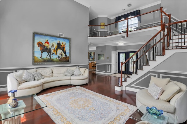 8 Wisteria Ln, Lake Grove, NY 11755 - living room with stairs, ornamental molding, a high ceiling, plenty of natural light, and wood finished floors