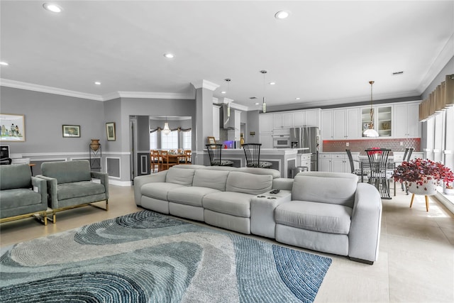 8 Wisteria Ln, Lake Grove, NY 11755 - living area featuring crown molding, recessed lighting, and wainscoting