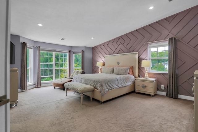 8 Wisteria Ln, Lake Grove, NY 11755 - bedroom with carpet floors, multiple windows, an accent wall, and recessed lighting