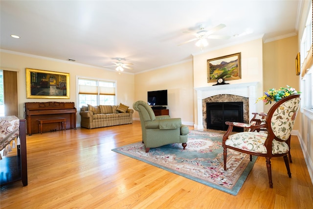 14 Gordon Ave, Plainview, NY 11803 - living area with ceiling fan, light wood-type flooring, a high end fireplace, ornamental molding, and baseboards