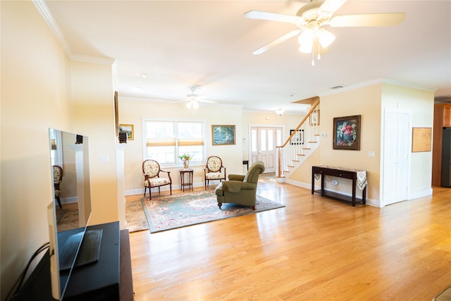 14 Gordon Ave, Plainview, NY 11803 - living room featuring ceiling fan, ornamental molding, stairs, light wood finished floors, and baseboards