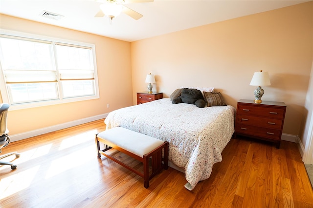 14 Gordon Ave, Plainview, NY 11803 - bedroom with wood finished floors, baseboards, and ceiling fan