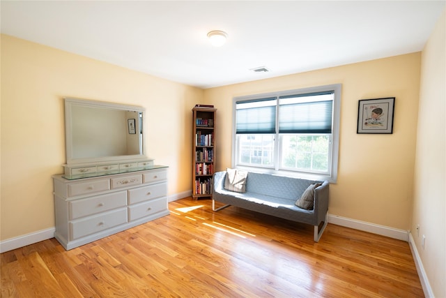 14 Gordon Ave, Plainview, NY 11803 - sitting room featuring light wood finished floors and baseboards