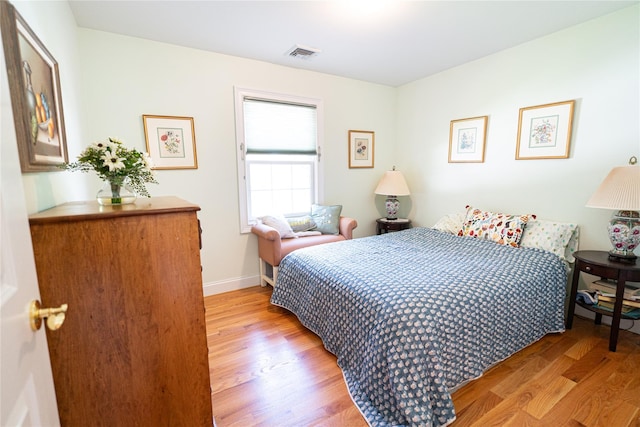 14 Gordon Ave, Plainview, NY 11803 - bedroom with light wood finished floors and baseboards