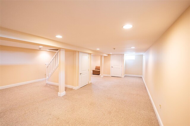 14 Gordon Ave, Plainview, NY 11803 - finished below grade area with recessed lighting, light carpet, stairway, and baseboards