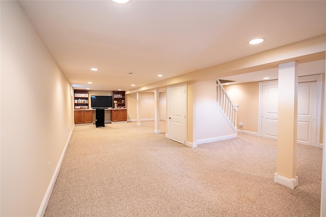 14 Gordon Ave, Plainview, NY 11803 - finished basement featuring light carpet, recessed lighting, stairway, and baseboards