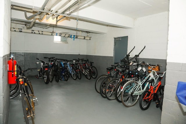 100 Randall Ave Unit 4J, Freeport, NY 11520 - garage featuring bike storage and concrete block wall