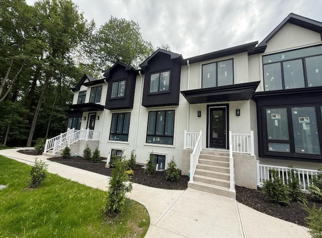 615 Union Rd, Spring Valley, NY 10977 - townhome / multi-family property with stucco siding