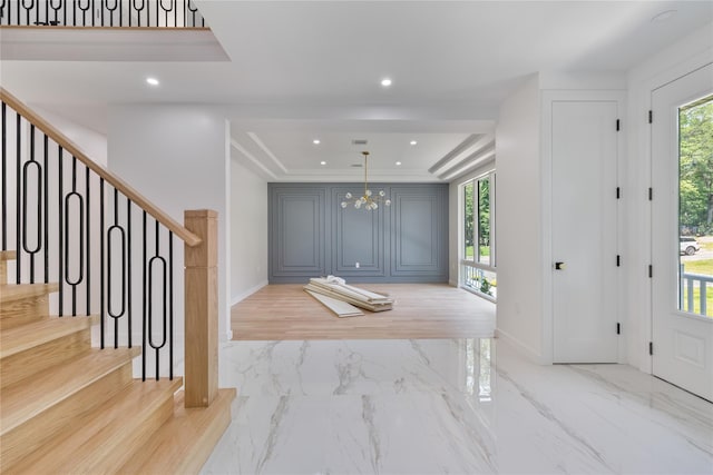 615 Union Rd, Spring Valley, NY 10977 - foyer entrance featuring a tray ceiling, light marble finish floors, a chandelier, stairway, and recessed lighting