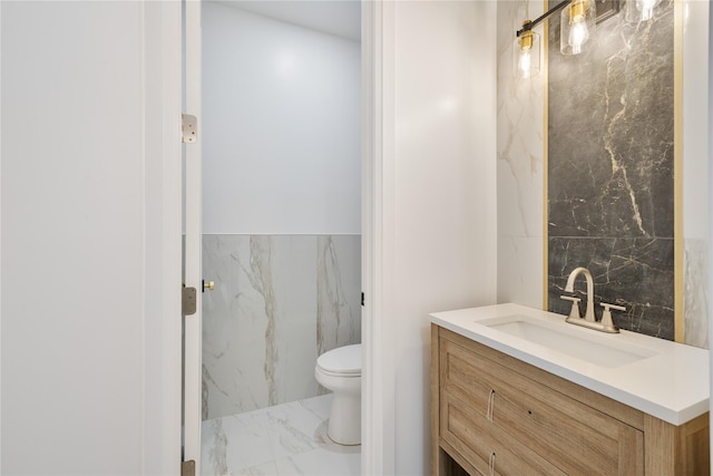615 Union Rd, Spring Valley, NY 10977 - bathroom with marble look tiles, vanity, and tile walls