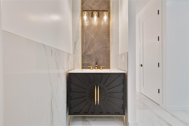 615 Union Rd, Spring Valley, NY 10977 - bathroom featuring marble finish flooring, vanity, and tile walls