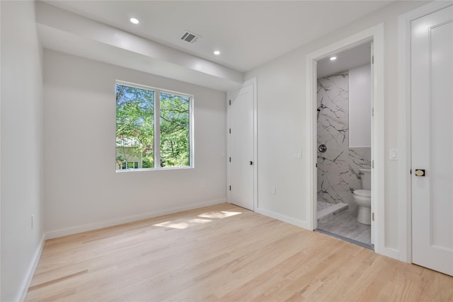615 Union Rd, Spring Valley, NY 10977 - unfurnished bedroom with wood finished floors, ensuite bath, and recessed lighting