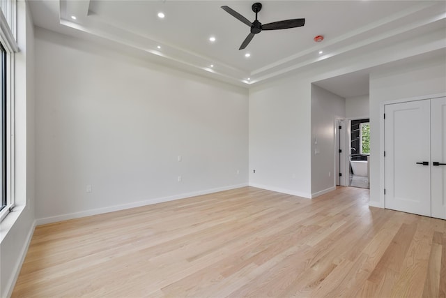 615 Union Rd, Spring Valley, NY 10977 - spare room featuring a raised ceiling, light wood finished floors, a ceiling fan, and recessed lighting