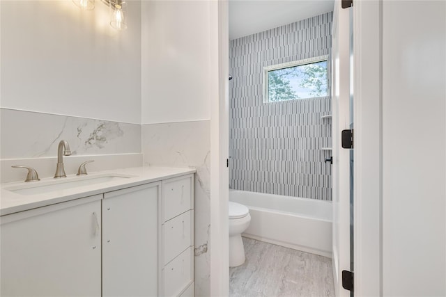 615 Union Rd, Spring Valley, NY 10977 - bathroom with vanity, wood finished floors, and tub / shower combination