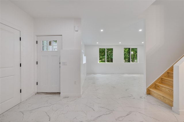 615 Union Rd, Spring Valley, NY 10977 - entryway with light marble finish floors, recessed lighting, and stairs