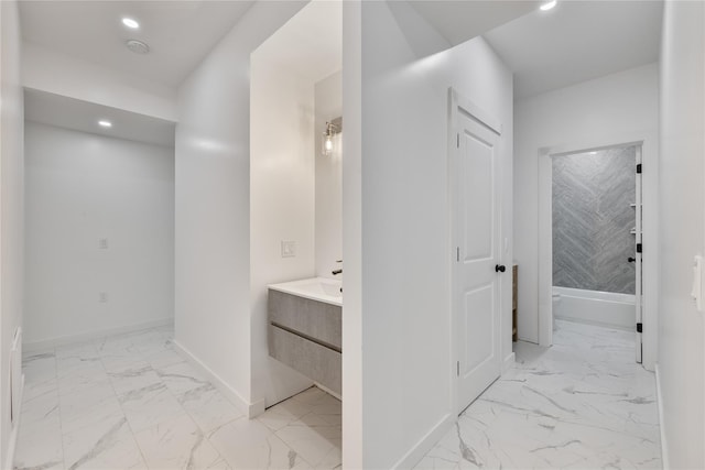 615 Union Rd, Spring Valley, NY 10977 - corridor featuring light marble finish flooring and recessed lighting